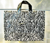 Plastic Shopping Bag (16" x 6" x 12")